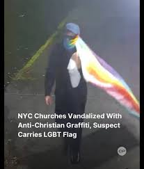 Masked Suspect Vandalizes Three NYC Churches With Anti-Christian Messages While Carrying LGBT Flag